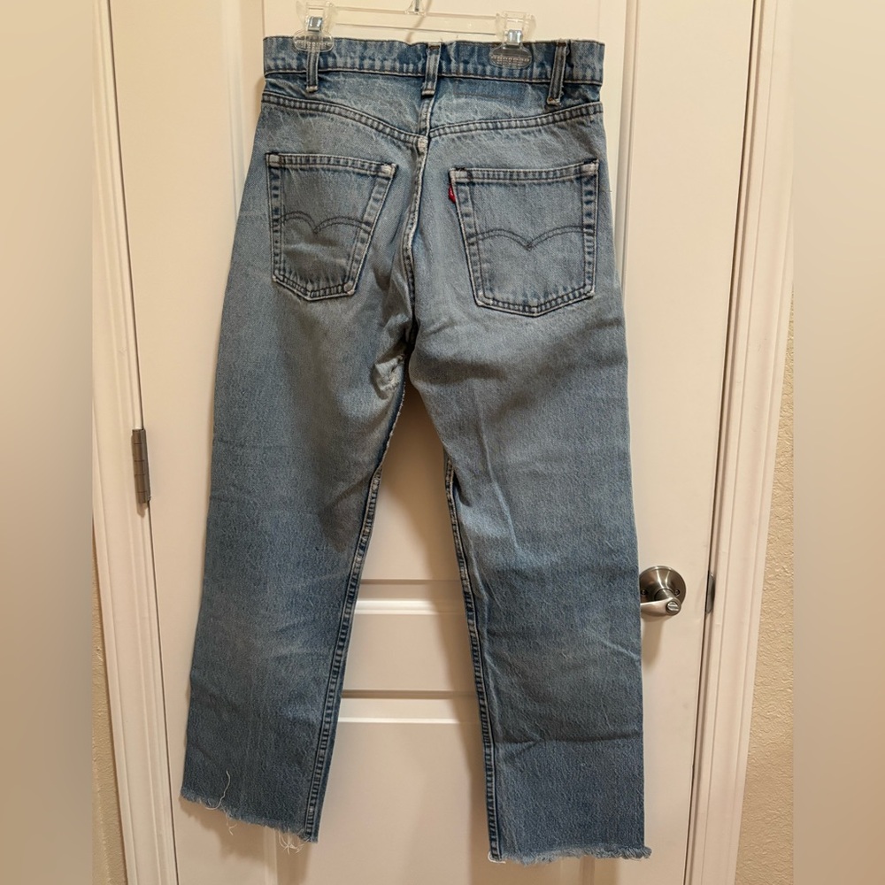 Highly distressed Levi’s women’s jeans denim